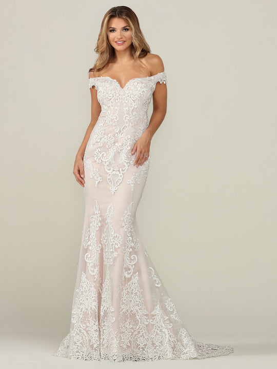 A woman models the Avery Austin "Samantha - Tried On Sample" wedding dress in ivory/blush, featuring off-the-shoulder lace with a floral pattern, standing against a light background and smiling with her hand on her hip.