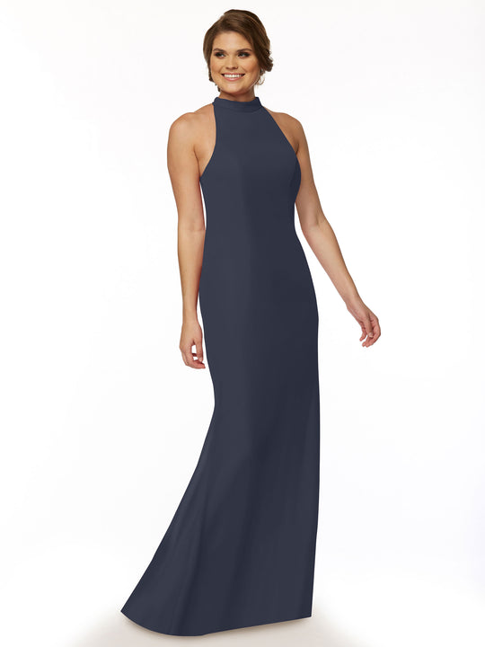 A woman wears the Avery Austin 80068, a sleeveless floor-length navy blue chiffon bridesmaid dress with a high neckline, smiling against a plain white background.