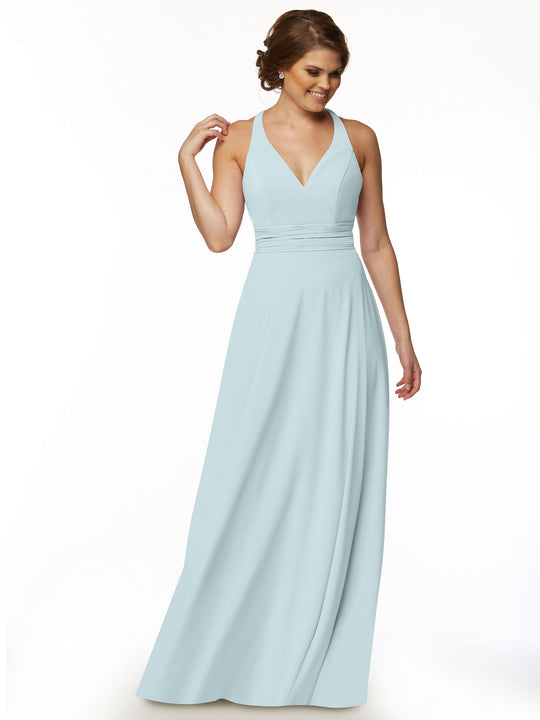 A woman models Avery Austin’s 80107, a light blue, sleeveless A-line dress with a fitted waist and V-neckline, standing against a white background and smiling while looking down for a feminine touch.