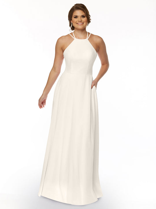 A woman in the Avery Austin 83006, a white A-line dress with a halter neckline.