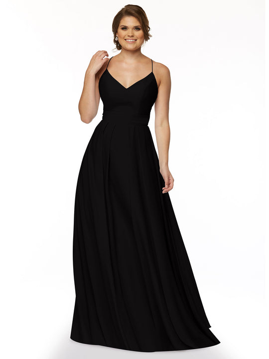 A woman models Avery Austin's 83027—a sleeveless, floor-length black A-line dress with spaghetti straps—standing against a white background, smiling and holding a lock of her hair.