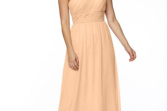 Model wearing a plus-size a-line bridesmaid dress from Avery Austin
