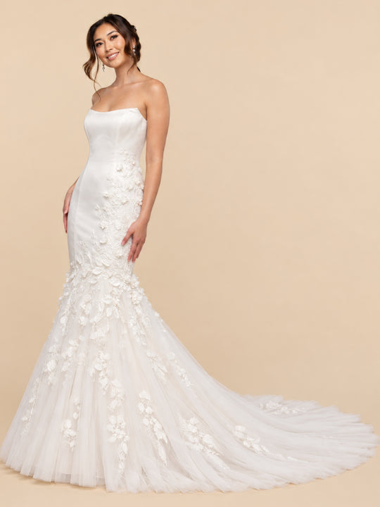 AveryAustin Lucienne diamond white, strapless scoop neckline mermaid wedding dress with floral appliques and a long tulle train for a modern bridal look.