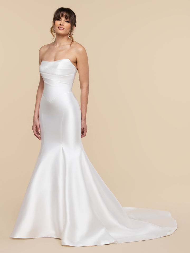 Avery Austin Monroe wedding dress in diamond white, featuring a strapless, fitted, scoop-neckline bodice and a trumpet-style train.