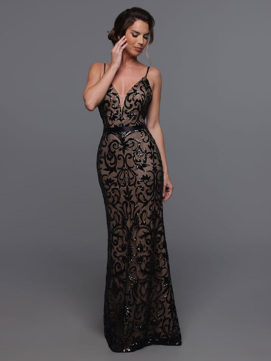 A woman wears the Avery Austin TH-80088, a long black/nude sequin bridesmaid dress with thin straps and swirling patterns, standing against a plain gray background.