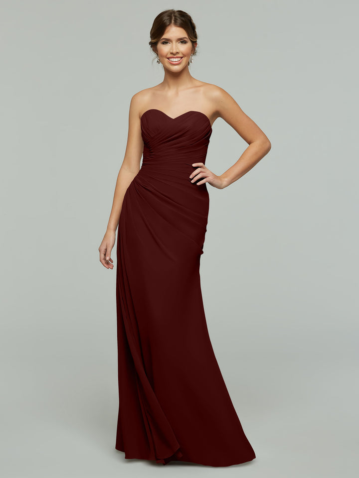Model wears Avery Austin style 80028, a floor-length burgundy chiffon gown with ruched bodice and sweetheart neckline, shown against a light gray background.