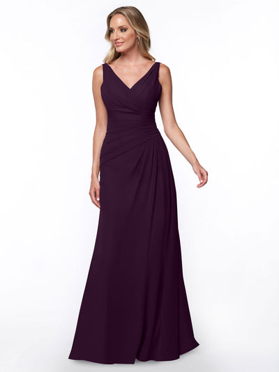 A woman models the Avery Austin 80030—a sleeveless, floor-length deep purple sheath dress with a V-neckline and ruched bodice—against a plain white background.