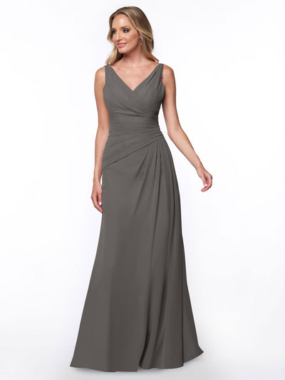 A woman models the Avery Austin 80030, a floor-length charcoal gray sheath dress with a sleeveless V-neckline and ruched bodice, against a white background.