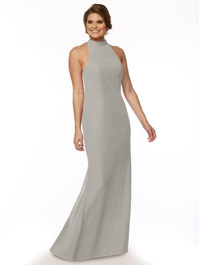 A woman with short, styled hair smiles against a white background wearing Avery Austin's 80068, a sleeveless, floor-length light gray halter bridesmaid dress featuring a high neckline.