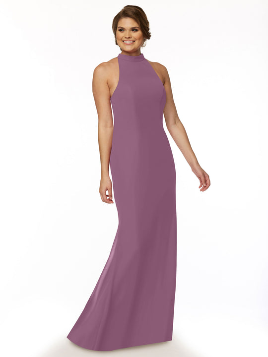 A woman smiles in the Avery Austin 80068, a sleeveless floor-length mauve chiffon bridesmaid dress with a high neckline. She has short styled hair and poses against a plain white background.