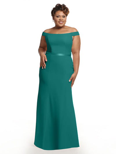 A woman models the Avery Austin 80079, a floor-length teal off-the-shoulder bridesmaid dress, standing against a white background with one hand at her side and the other on her hip.