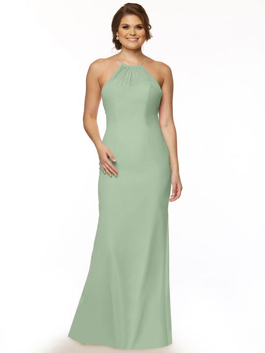 A woman with loose light brown waves smiles, wearing the Avery Austin TH-80083: a sleeveless, floor-length sage green chiffon halter dress with a keyhole back. She accessorizes lightly, posed against a plain white background.