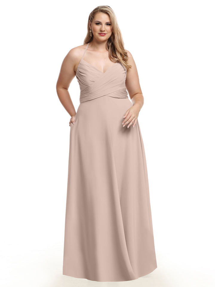 A woman with long, wavy blonde hair and a gentle expression wears Avery Austin&