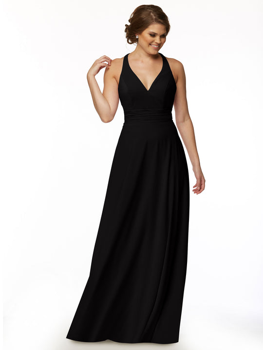 A woman wearing the Avery Austin 80107 dress, a feminine sleeveless black V-neck A-line style, stands smiling against a plain white background, her hair in an elegant updo as she looks down.