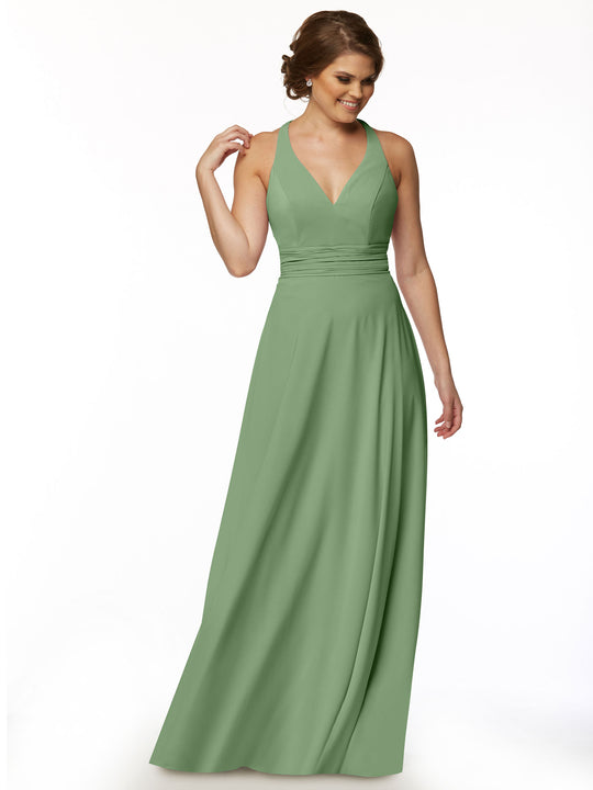 Model wearing Avery Austin dress 80107—sleeveless, floor-length sage green A-line with a V-neckline and fitted waist—stands against a white background, smiling and looking to the side for a soft, feminine look.