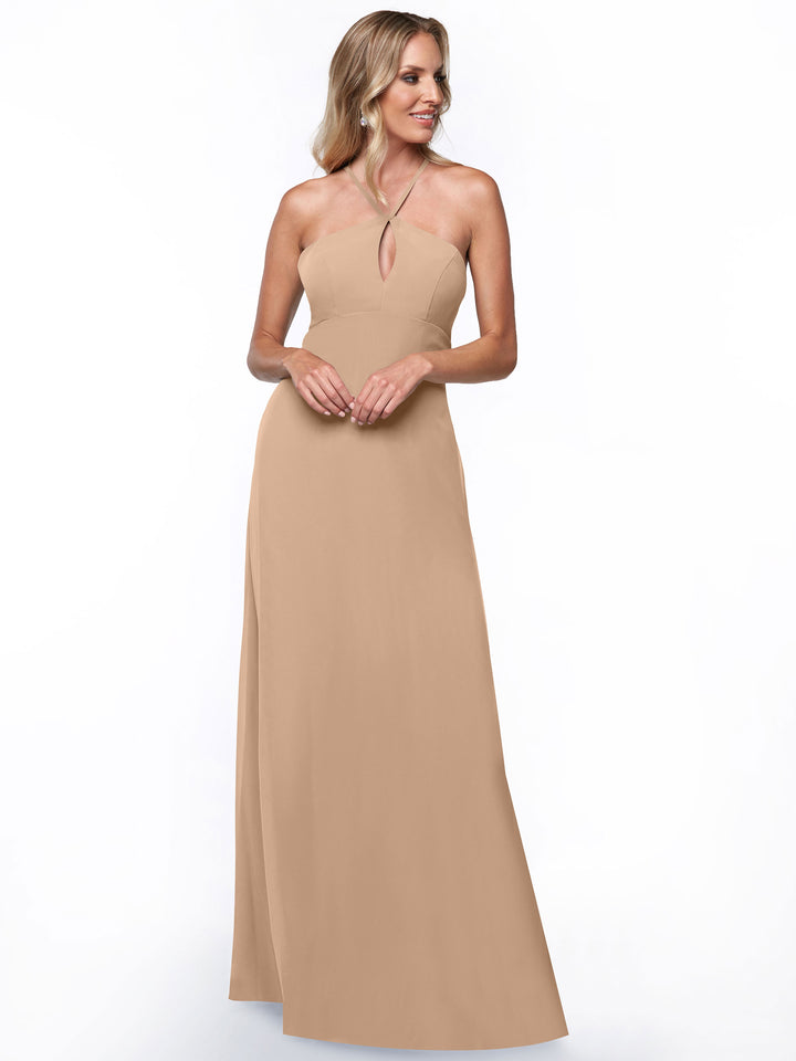 A woman models the Avery Austin 80137, a long, strapless beige dress with a keyhole neckline and minimalistic design, smiling against a plain white background.