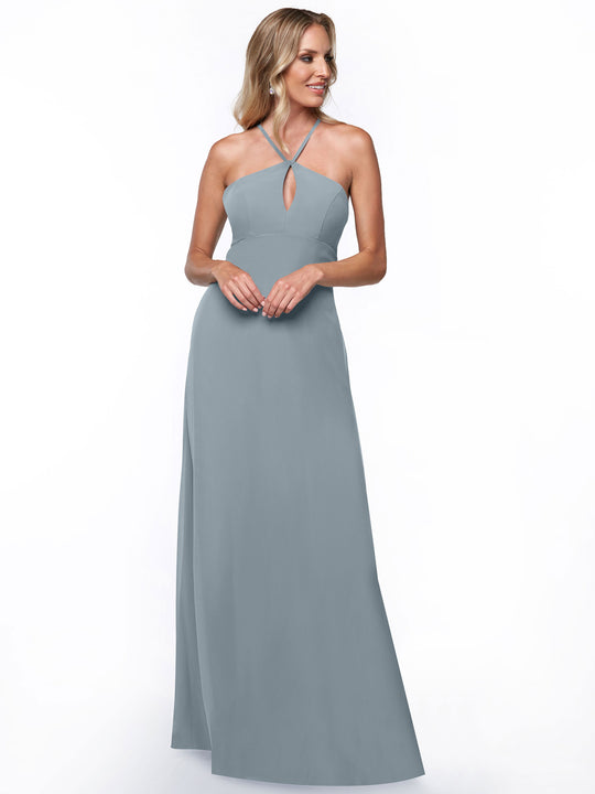 A woman models Avery Austin's 80137—a floor-length, light blue halter dress with a keyhole neckline—standing against a white background, smiling and looking to the side in this minimalistic style.