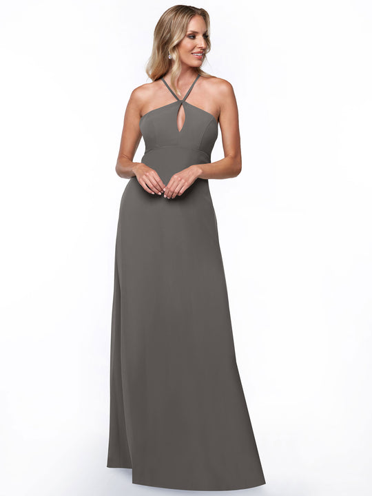 A woman models the Avery Austin TH-80137: a long, sleeveless dark gray halter dress with a keyhole neckline, posing against a plain white background and smiling softly to the side.