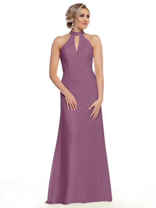 A woman models the Avery Austin 80138, a sleeveless, floor-length mauve gown featuring a halter neckline and keyhole cutout. Her blonde hair is styled in an updo as she poses elegantly against a plain white background.