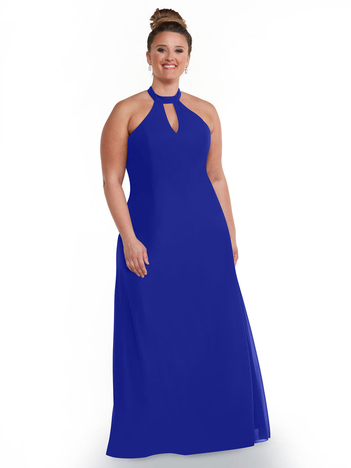 A woman smiles in the Avery Austin 80138 dress—a sleeveless, floor-length royal blue gown with a halter neckline and open back—posing against a plain white background.