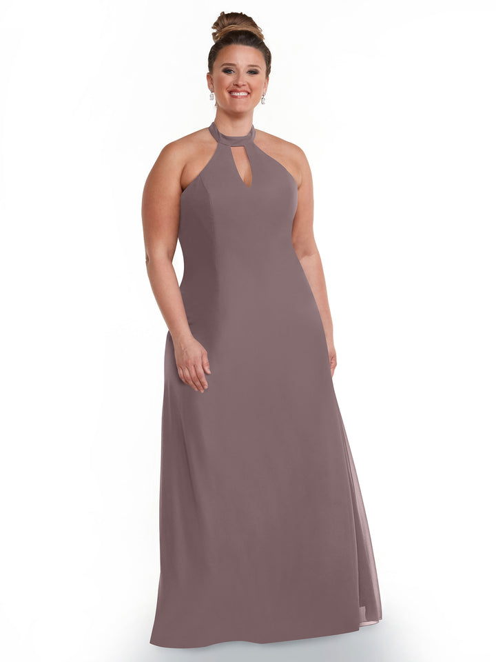 A woman smiles in the Avery Austin 80138, a floor-length sleeveless mauve gown with a halter neckline and keyhole detail, showcasing her shoulders against a plain white background.