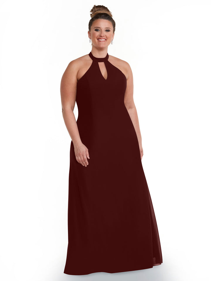 A woman smiles in the Avery Austin 80138 dress, a sleeveless maroon halter gown with a keyhole neckline. Her hair is in an updo as she poses against a plain white background.