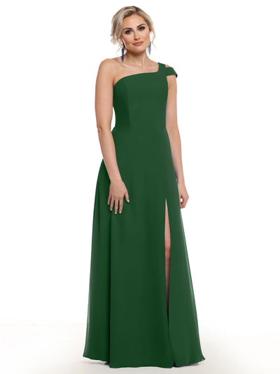 A woman models Avery Austin's floor-length, forest green, one-shoulder dress (style 80139) with a thigh-high slit, standing against a plain white background.