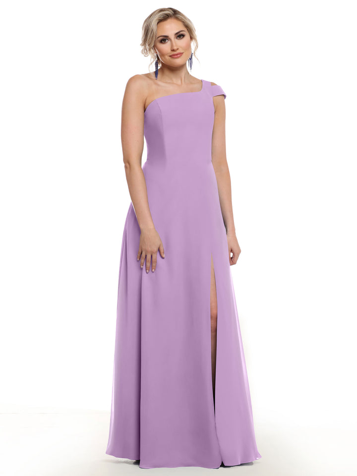 A woman showcases the Avery Austin TH-80139, a floor-length lilac one shoulder dress with a thigh-high side slit, standing against a plain white background.