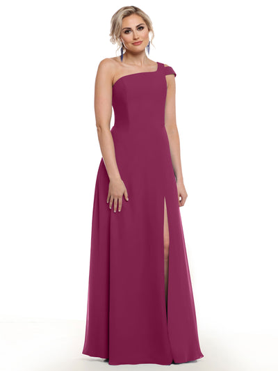 A woman models the Avery Austin 80139, a sophisticated floor-length magenta dress with an asymmetric neckline and side slit, against a plain white background.