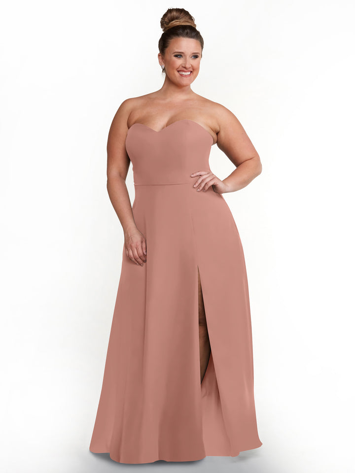 A woman with a bun wears Avery Austin&