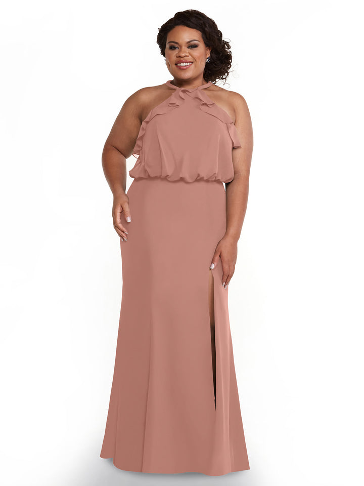 A woman models Avery Austin’s 80147—a fitted chiffon dress with a ruffled halter top and thigh-high side slit—smiling against a plain white background.