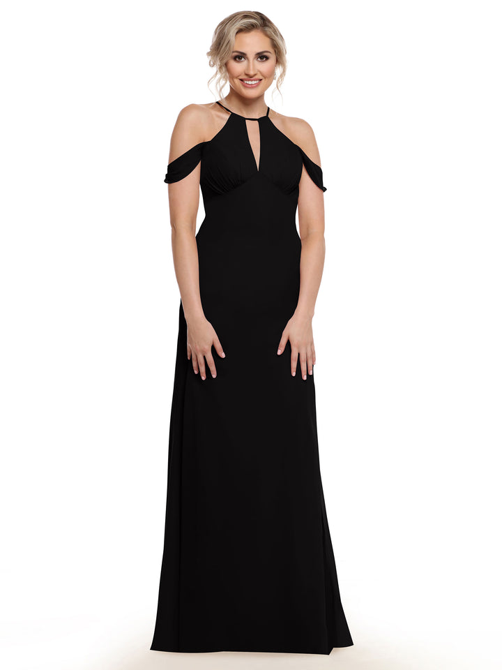 A woman wearing Avery Austin style 80148, a long black off-the-shoulder evening gown with a keyhole neckline, smiles against a plain white background.