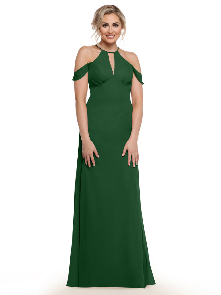 A woman with blonde hair in an updo wears Avery Austin&