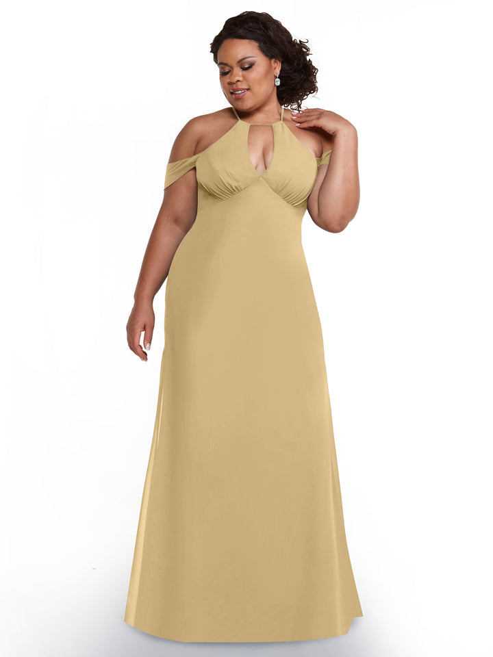 A woman in the Avery Austin 80148, a floor-length light gold dress with a halter neckline and chiffon cap sleeves, stands against a white background, gently touching her neck and looking to the side.