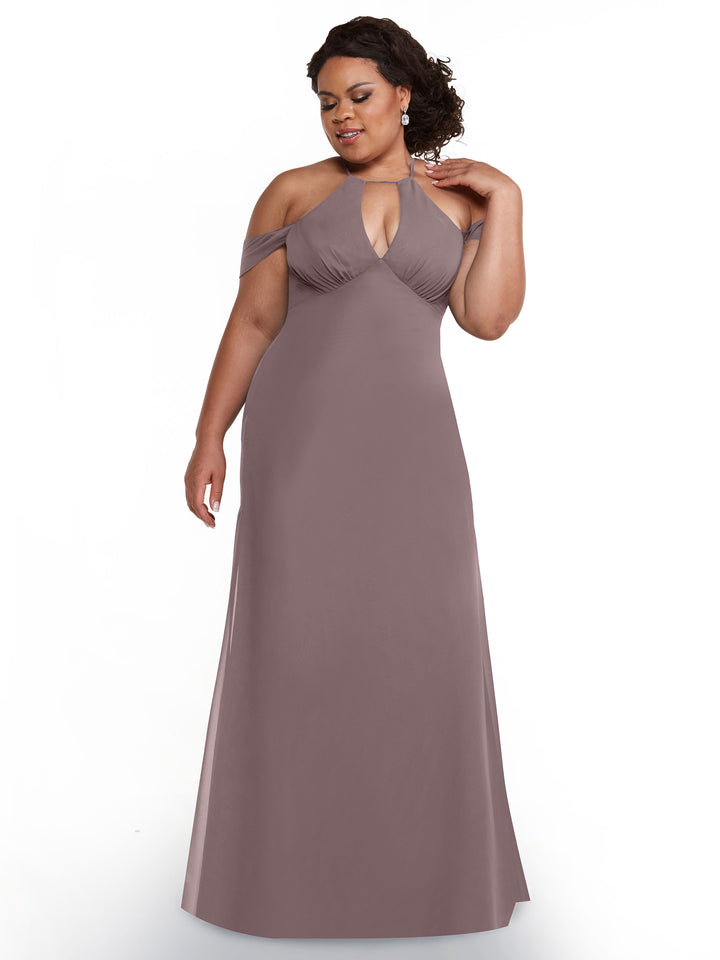 A woman wearing the Avery Austin 80148, a floor-length mauve halter dress, stands against a white background, gazing to the side with one hand touching her neck.