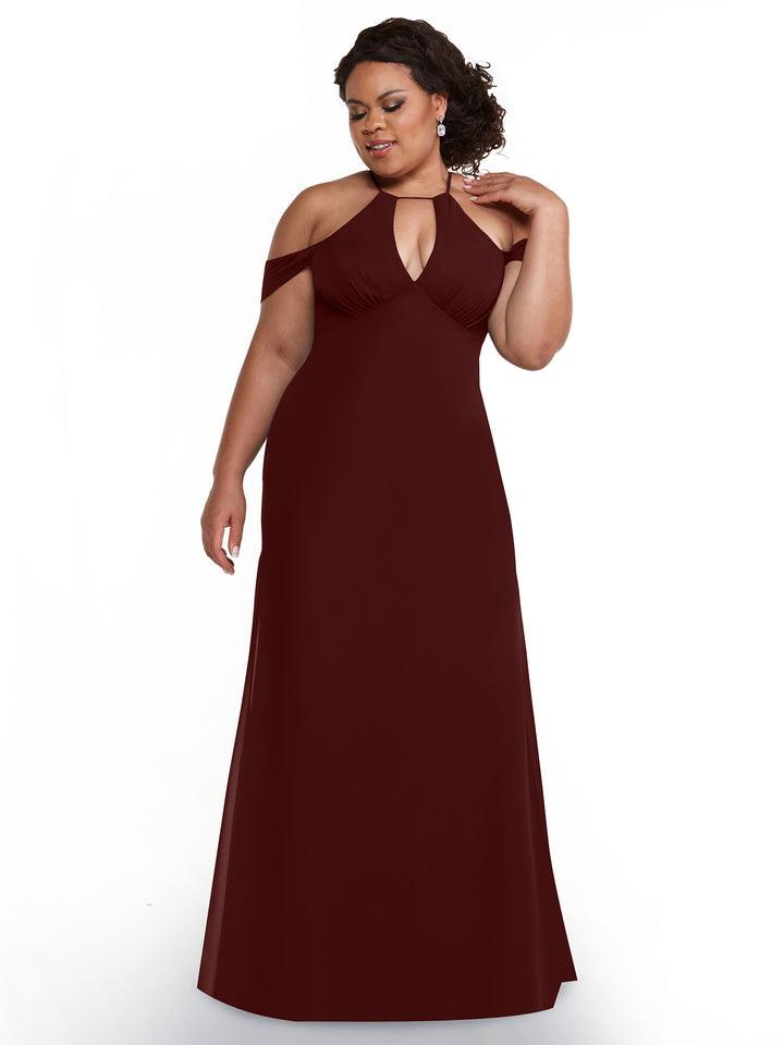 A woman models Avery Austin’s 80148, a sleeveless, floor-length burgundy halter dress with off-the-shoulder straps, standing against a plain white background and looking to the side with one hand on her shoulder.