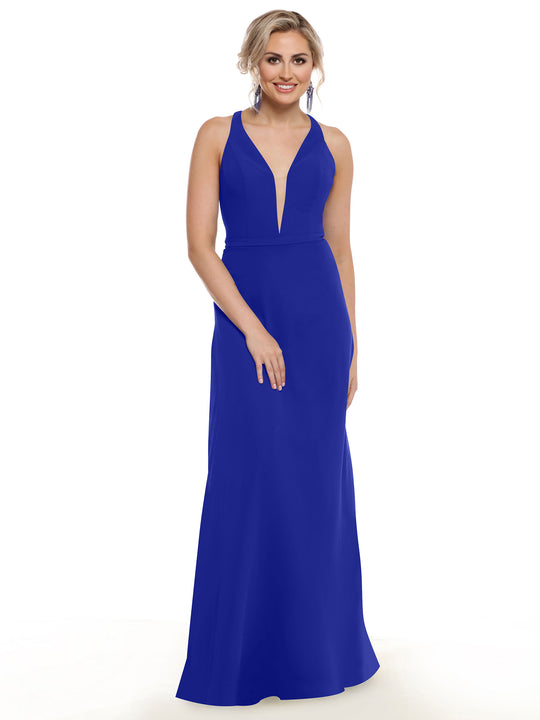 A woman with light hair styled up smiles in the Avery Austin TH-80150, a sleeveless royal blue floor-length gown with a plunging neckline, posing against a white background with one hand resting on the other.