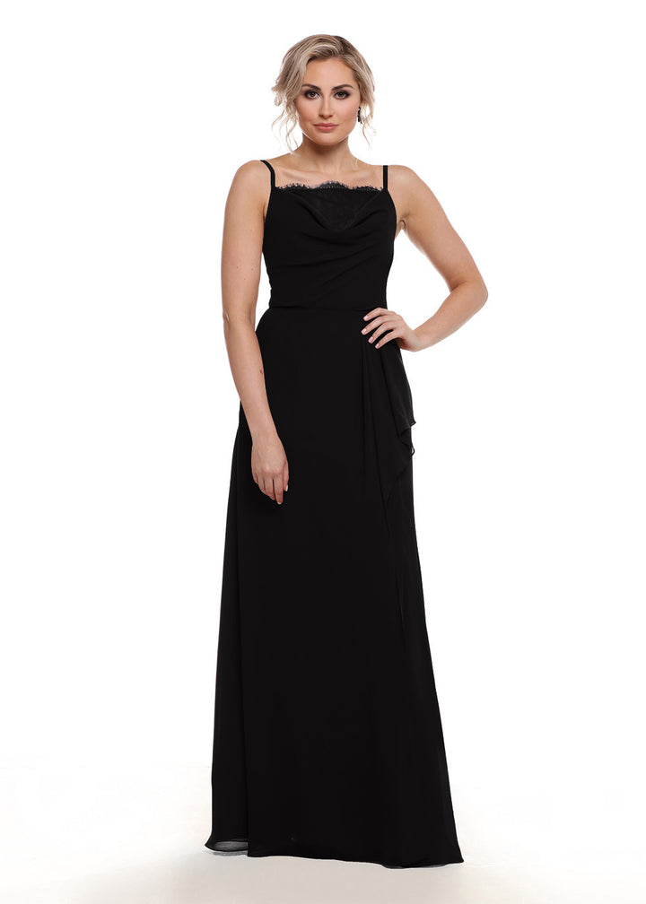 A woman with loose, wavy light hair and a neutral expression wears Avery Austin’s 80152—a long, sleeveless chiffon A-line dress featuring thin straps and a delicate lace bust—posed against a white background.