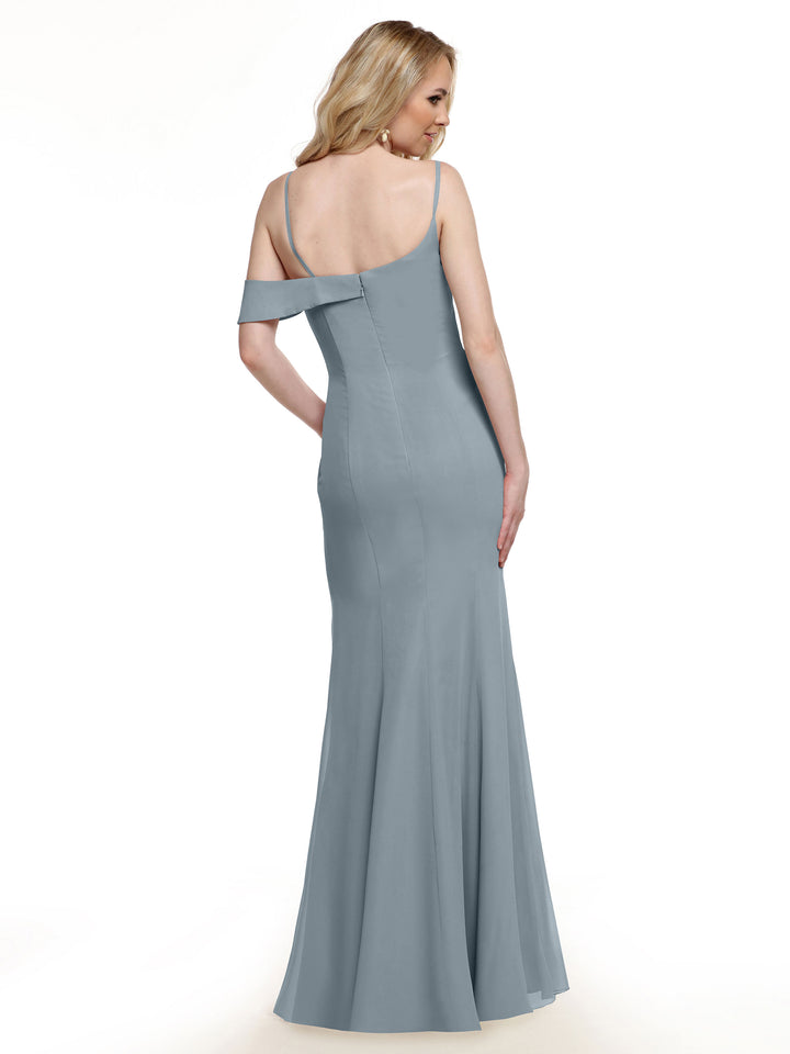 A woman with long blonde hair, seen from behind, models Avery Austin style 80153: a light blue, floor-length chiffon bridesmaid dress with spaghetti straps and off-the-shoulder detail against a white background.