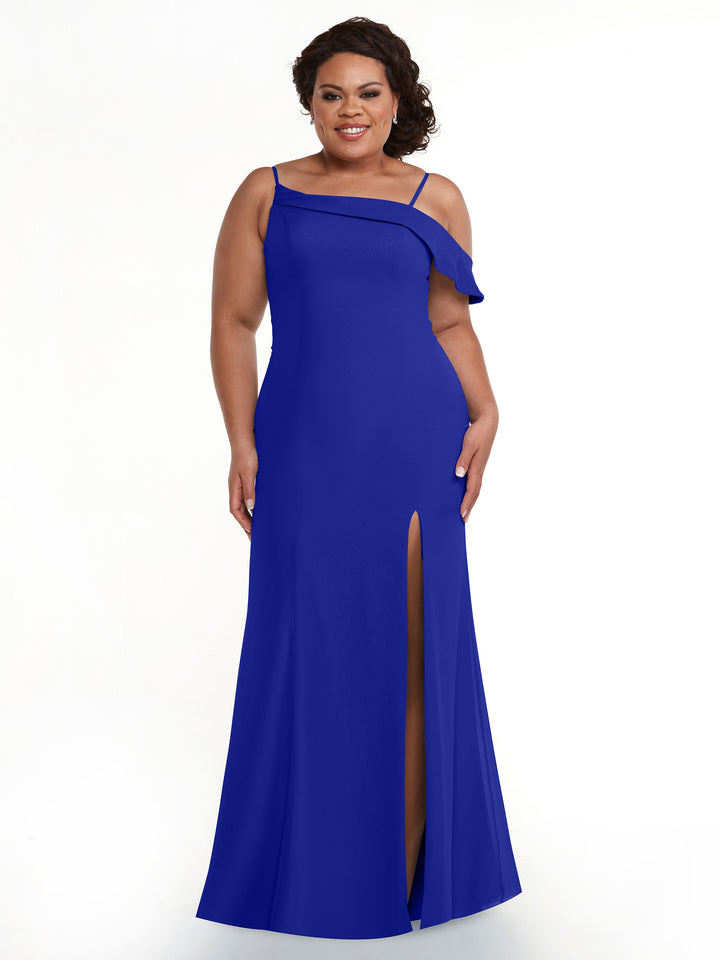 A woman smiles against a white background, wearing Avery Austin&