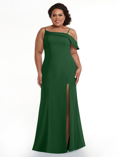 A woman smiles against a white background in the Avery Austin 80153 dress. The Hunter Green, floor-length gown features an asymmetrical ruffle sleeve, high slit, fitted silhouette, sleeveless design, and unique neckline.