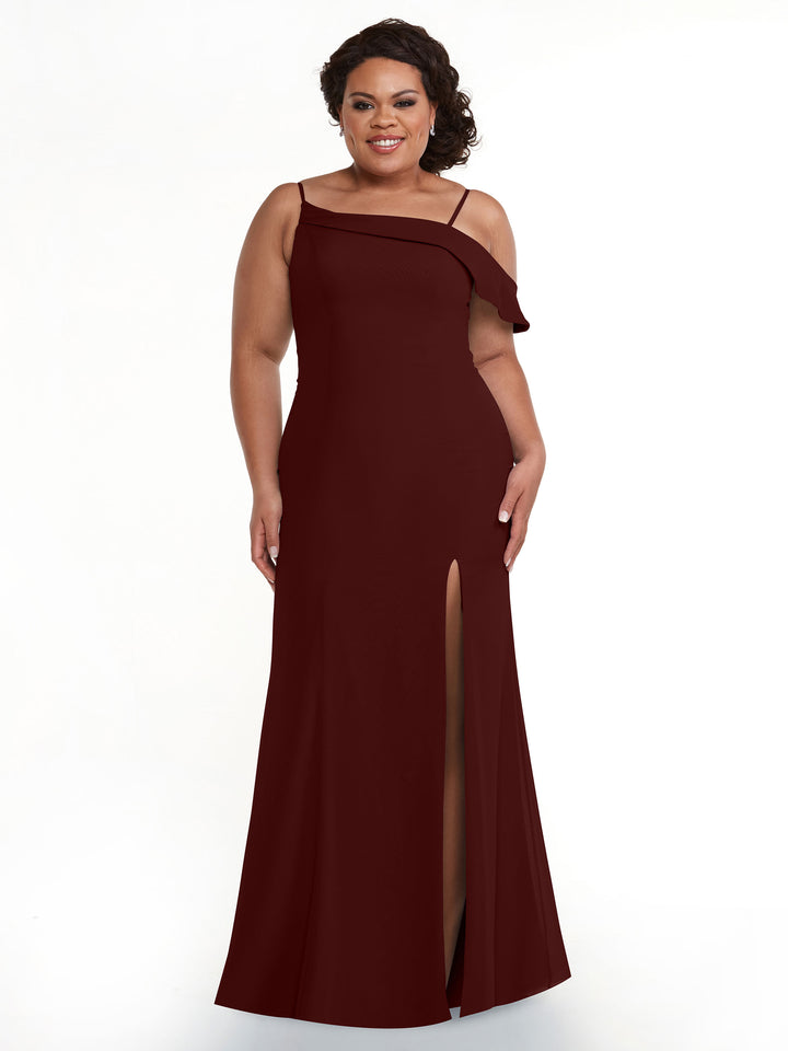 A woman wearing the Avery Austin 80153 sleeveless burgundy fit-and-flare bridesmaid dress with a thigh-high slit, smiling while standing against a plain white background.