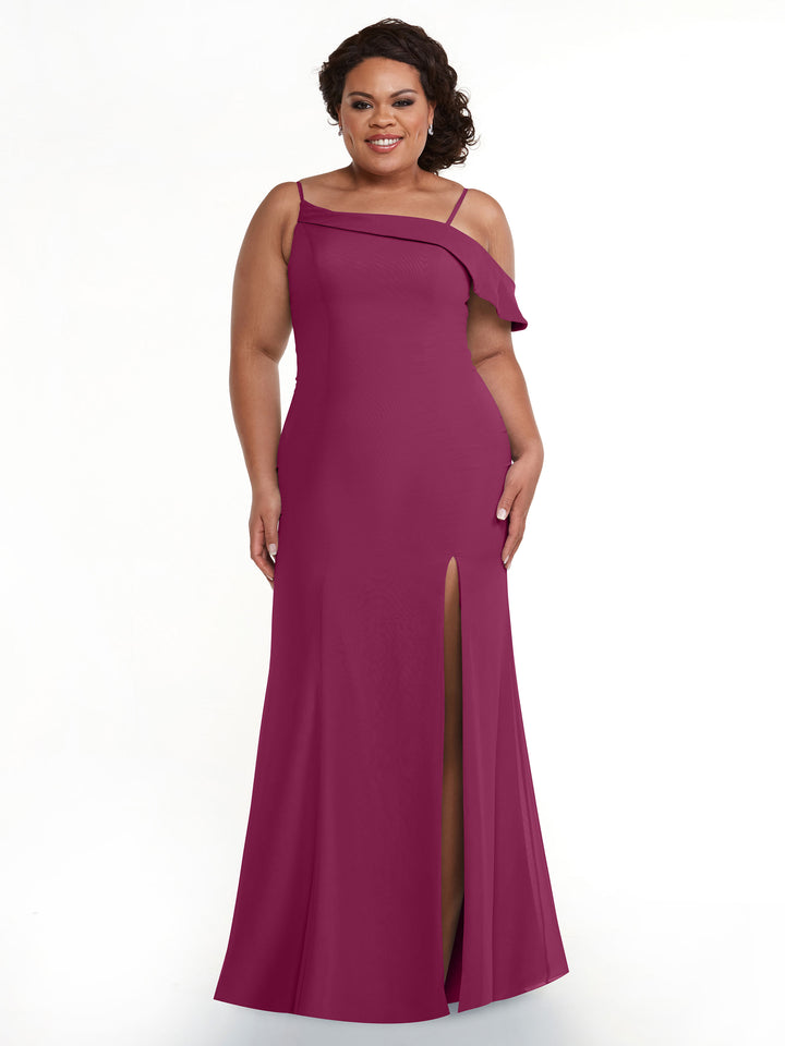 A woman smiles against a white background wearing the Avery Austin TH-80153 bridesmaid dress in plum—a floor-length, fit-and-flare gown with one off-shoulder strap and a thigh-high slit.