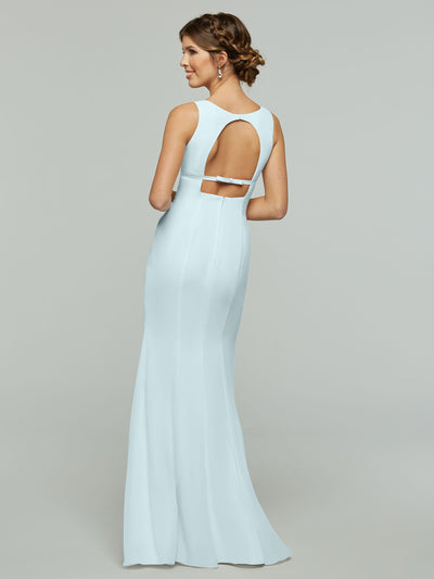 A woman with her hair in an elegant updo stands with her back to the camera, wearing Avery Austin’s 80155: a light blue, floor-length fit and flare chiffon gown with an open keyhole back and horizontal strap.