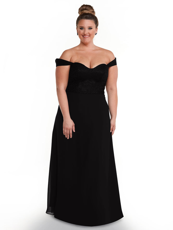 A woman with her hair in a bun wears Avery Austin&