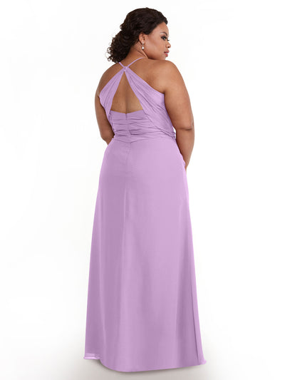 A woman in the Avery Austin 80167, a floor-length sleeveless lavender chiffon dress with a ruched bodice, sweetheart neckline, and open back, stands facing away and looks over her shoulder against a plain white background.