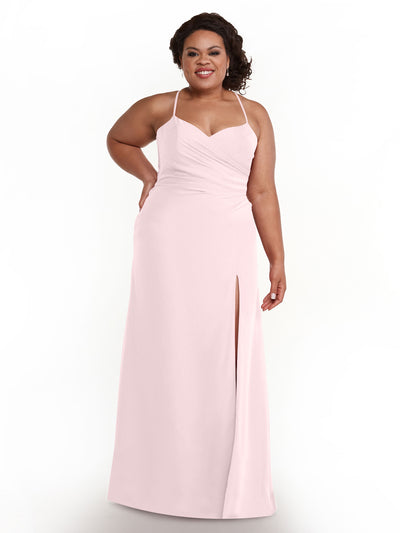 A woman wearing Avery Austin style 80167, a Rose Petal chiffon dress with a sweetheart neckline, spaghetti straps, and a thigh-high slit, smiles against a plain white background.