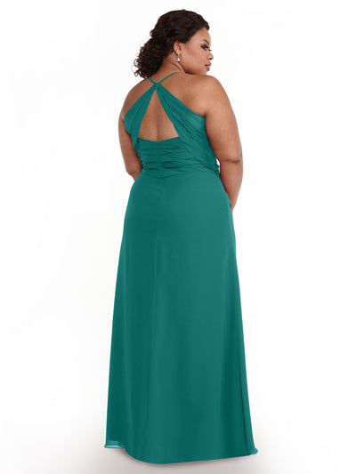 A woman faces away in the Avery Austin 80167 dress—a long teal chiffon gown with ruched details and a keyhole back. Her curly hair is pulled back as she poses against a plain white background.