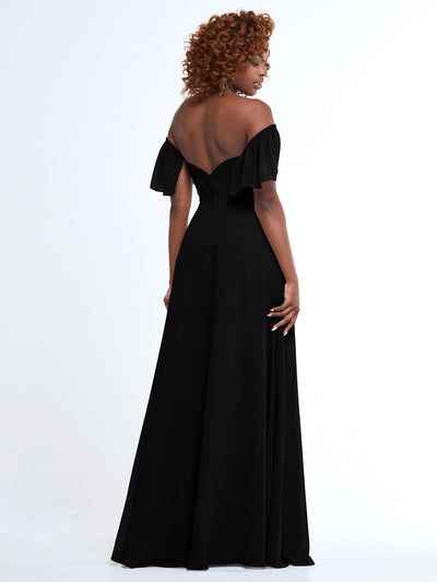 A woman faces away in Avery Austin’s 80168—a floor-length black chiffon gown with off-the-shoulder ruffled sleeves. Her curly hair is loose against a plain white background.