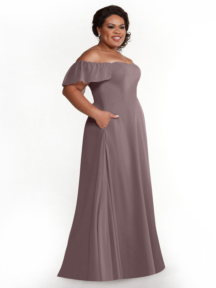 A smiling woman wears Avery Austin&